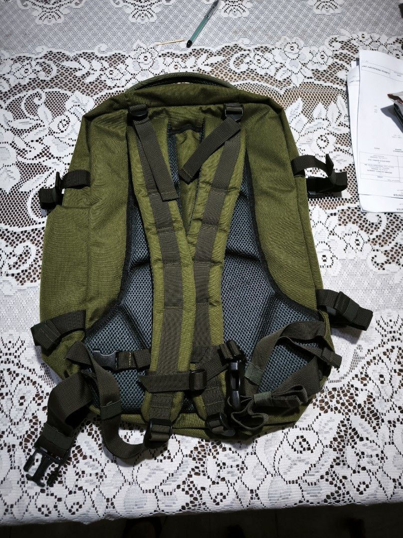 CabinZero Military 36L Backpack Green (Category: Backpacks) located in Quezon City. Submitted by dei_12 (Listing ID 1469814493, Image 2). Description: - Brand: CabinZero - Color: Green - Material: Durable nylon and polyester - Design: Front molle webbing and side compression straps with buckles - Comfort: Mesh padded shoulder straps and back panel - Interior: Wide-opening main compartment with zip pockets and mesh organizer sleeves - Condition: E
