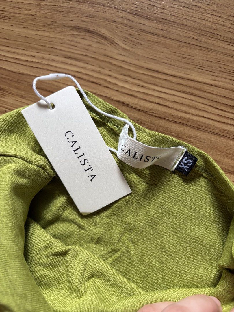 Calista Core Tube Top (Category: Others Tops) located in San Pedro. Submitted by nikkiabc.777 (Listing ID 1469762293, Image 2). Description: Calista Tube Top Color: Apple Green Size: XS; fits xs to s Fabric: Soft Cotton Ribbed; stretchy Brandnew; with tags and pouch.