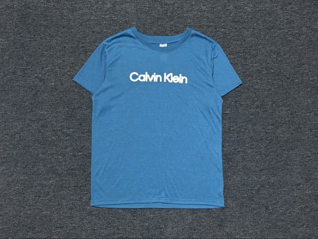 CALVIN KLEIN ACTIVEWEAR TSHIRT (Category: Activewear) located in Baras. Submitted by jnc__apparel (Listing ID 1469899859, Image 1). Description: 🏷️ CALVIN KLEIN ACTIVEWEAR TSHIRT 📌 Dimes: 24L x 17.5W 📌 Size: S-M for womens 📌 Condition: Like new 📌 Color rate: 10/10 📌 Issue: None ✅ Washed and ready to wear .