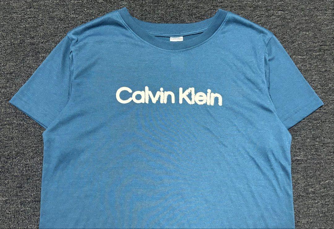 CALVIN KLEIN ACTIVEWEAR TSHIRT (Category: Activewear) located in Baras. Submitted by jnc__apparel (Listing ID 1469899859, Image 2). Description: 🏷️ CALVIN KLEIN ACTIVEWEAR TSHIRT 📌 Dimes: 24L x 17.5W 📌 Size: S-M for womens 📌 Condition: Like new 📌 Color rate: 10/10 📌 Issue: None ✅ Washed and ready to wear .
