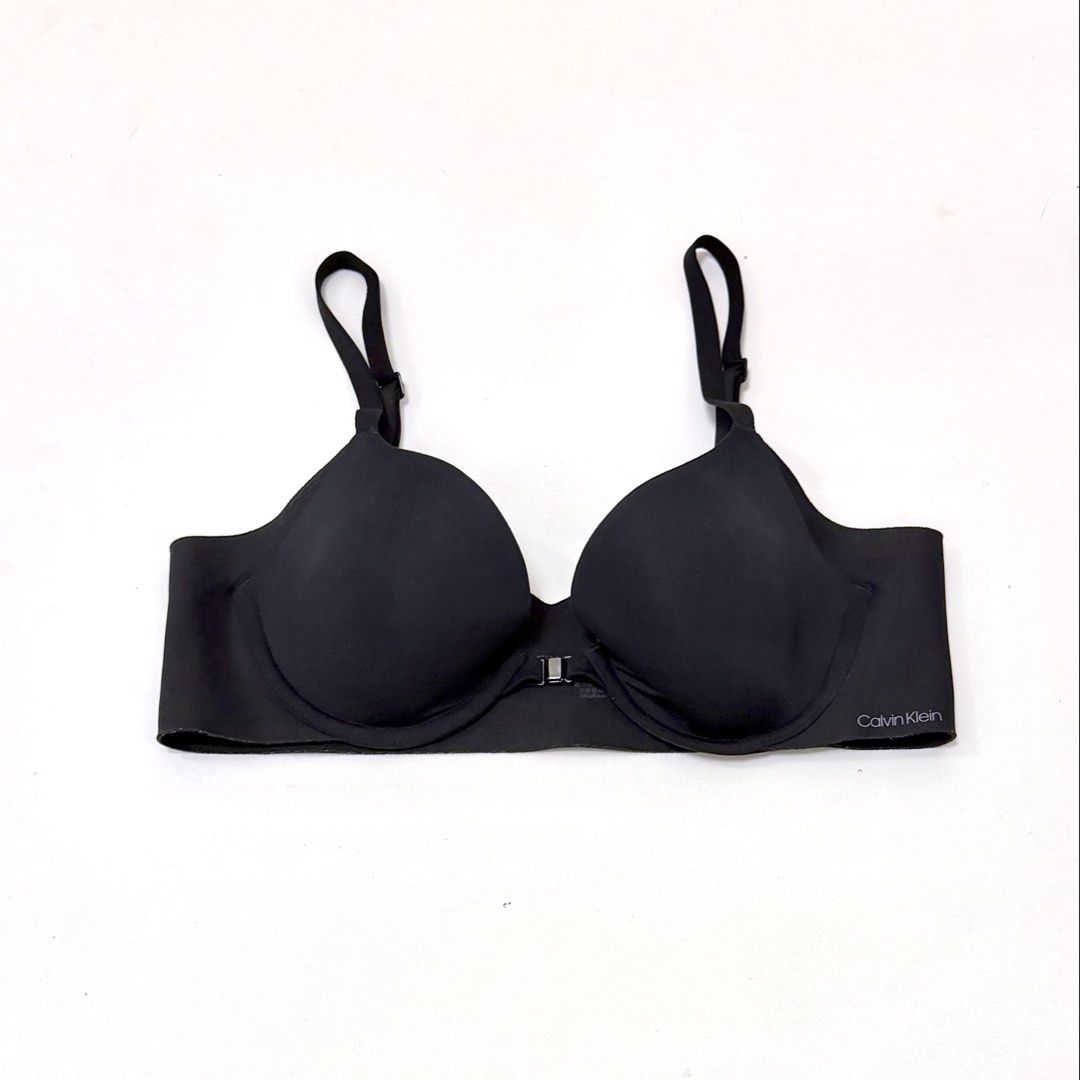 CALVIN KLEIN Black Front-Closure Seamless Bra [34B] (Category: Undergarments & Loungewear) located in Malabon City. Submitted by k_intimates (Listing ID 1469932465, Image 1). Description: Details: • 34B / wired / lightly lined • No issues • Calvin Klein lightly lined T-shirt bra featuring seamless style wings and the Calvin Klein logo printed on the lower left band..