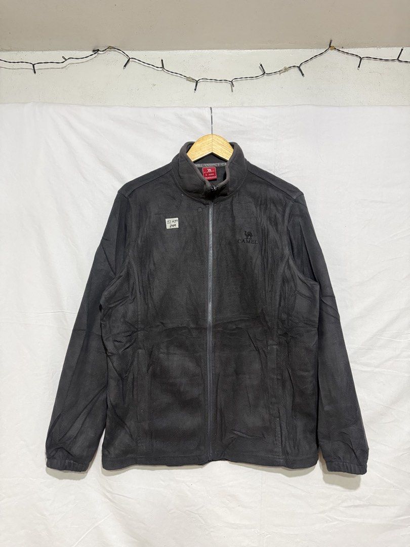 Camel Fleece Zip-Up Jacket Dark Grey Size XL (Category: Coats, Jackets and Outerwear) located in Quezon City. Submitted by dapanaaaay (Listing ID 1469927617, Image 1). Description: - Brand: Camel - Color: Dark grey - Size: XL (fits regular) - Material: Soft, warm fleece fabric - Features: Full zip front, high collar, front pockets, and embroidered chest logo - Condition: Clean zipper and cuffs - Ideal for: Cold weather layering.