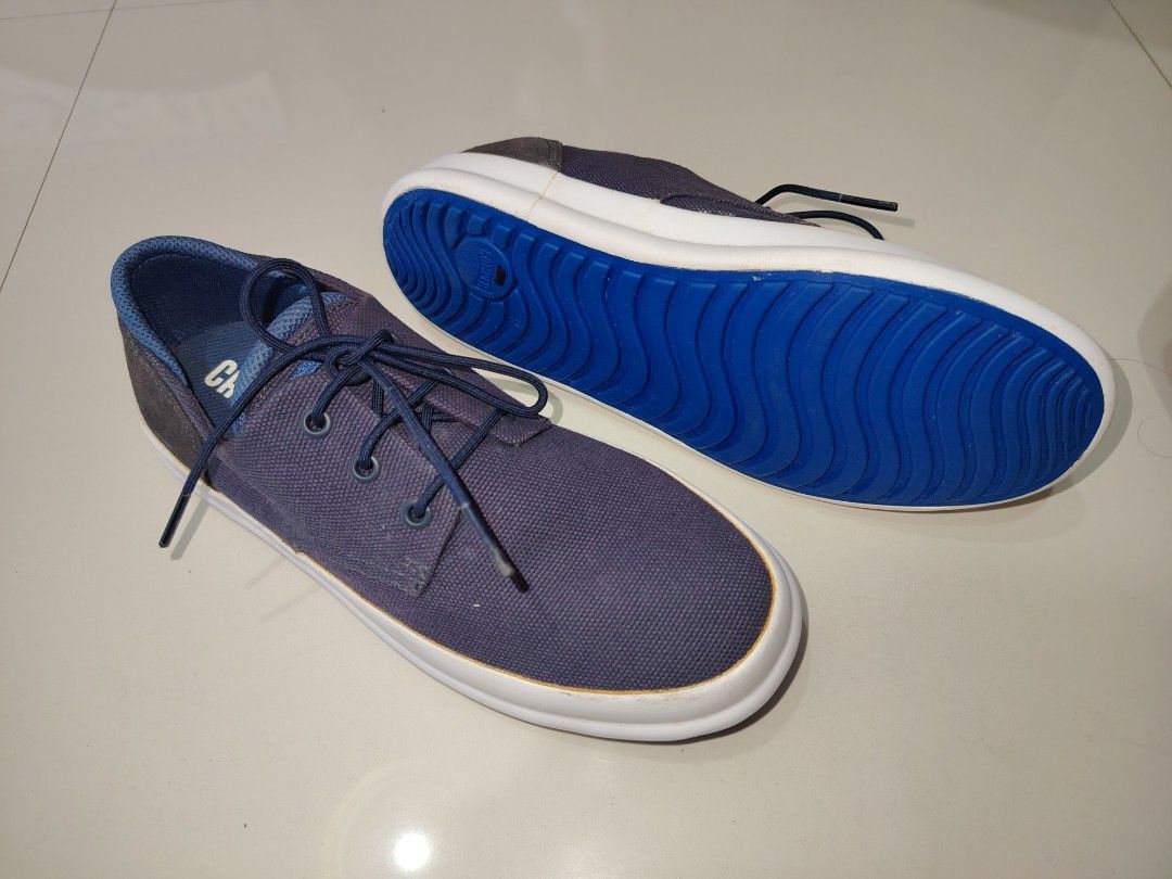 CAMPER Blue Casual Canvas Sneakers Size 39 (Category: Sneakers) located in Agdangan. Submitted by lordie87 (Listing ID 1469827949, Image 1). Description: - Brand: CAMPER - Style: Canvas sneakers - Color: Dark blue with white midsoles and bright blue rubber outsoles - Size: EU 39 - Features: Lace-up closure, wavy tread pattern for grip - Condition: Minimal wear on white rubber sides, clean and ready to wear.