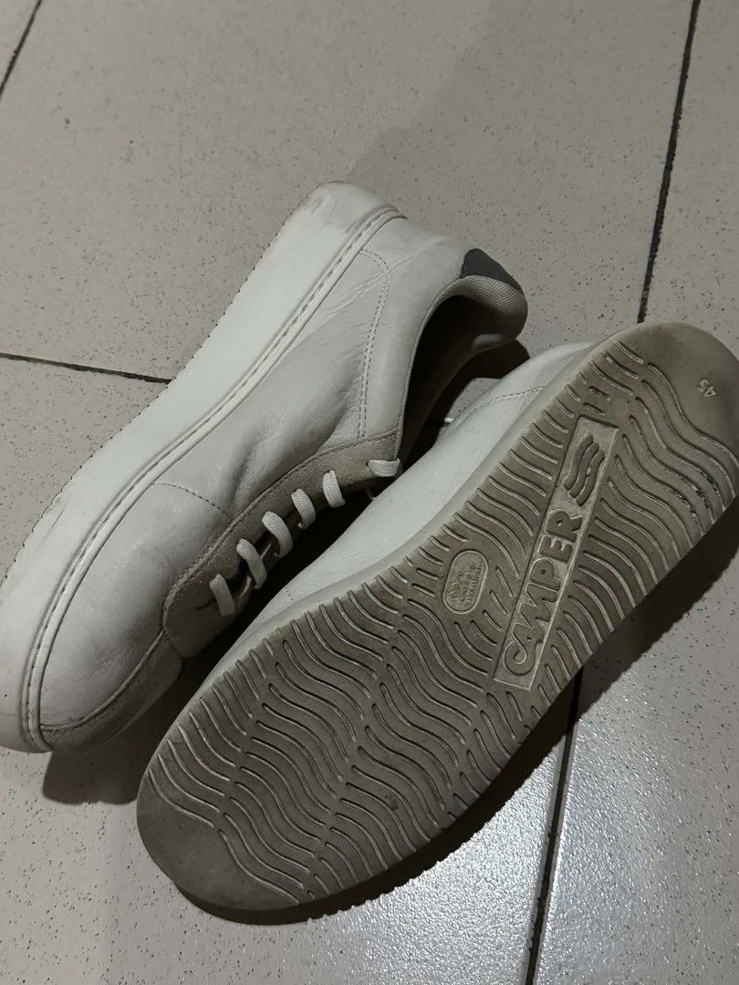 Camper Twins White Leather Sneakers Size 45 (Category: Casual Shoes) located in Manila. Submitted by morcillojo44726 (Listing ID 1469932595, Image 2). Description: Camper Twins leather sneakers in white with multi-color suede panels. Asymmetrical design with blue and green accents. Size 45 printed on the rubber sole. Wavy tread pattern underneath. Casual everyday shoes with classic Camper branding on the insoles..