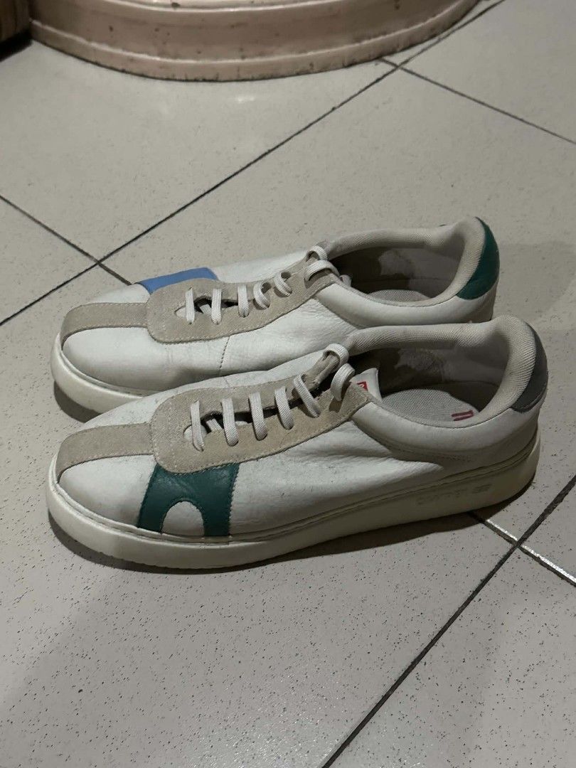 Camper Twins White Leather Sneakers Size 45 (Category: Casual Shoes) located in Manila. Submitted by morcillojo44726 (Listing ID 1469932595, Image 1). Description: Camper Twins leather sneakers in white with multi-color suede panels. Asymmetrical design with blue and green accents. Size 45 printed on the rubber sole. Wavy tread pattern underneath. Casual everyday shoes with classic Camper branding on the insoles..