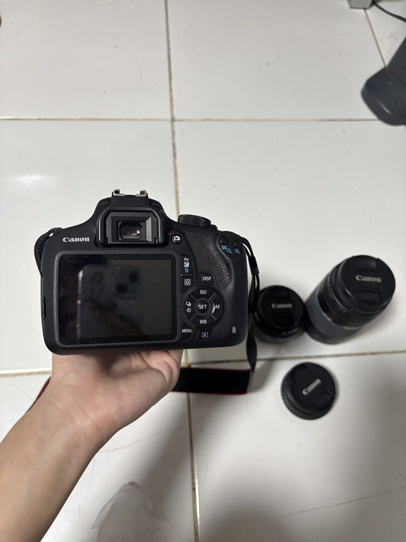 Canon EOS 1200D DSLR Camera for Sale (Category: Cameras) located in Manila. Submitted by chew._.ya (Listing ID 1469812195, Image 2). Description: Inclusions: * Canon EOS 1200D camera body * Canon EF-S 18-55mm lens and cover * Canon EF 75–300mm f/4–5.6 lens and cover * Canon EF 50mm f/1.8 II lens and cover * Battery and charger * Original strap * Camera bag * Free delivery or meetup NCR Note: Memory card is not included. The HDMI/USB port cover is