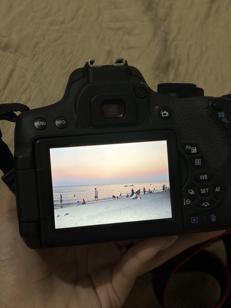 Canon EOS 750D DSLR Camera with 18-55mm Lens (Category: Cameras) located in Tarlac. Submitted by alxckretdump (Listing ID 1469925818, Image 3). Description: Canon EOS 750D DSLR camera with EF-S 18-55mm f/3.5-5.6 IS STM lens attached. Includes original neck strap and lens cap. Touchdown LCD screen flips out and rotates fully. Works great, takes sharp photos with accurate colors..