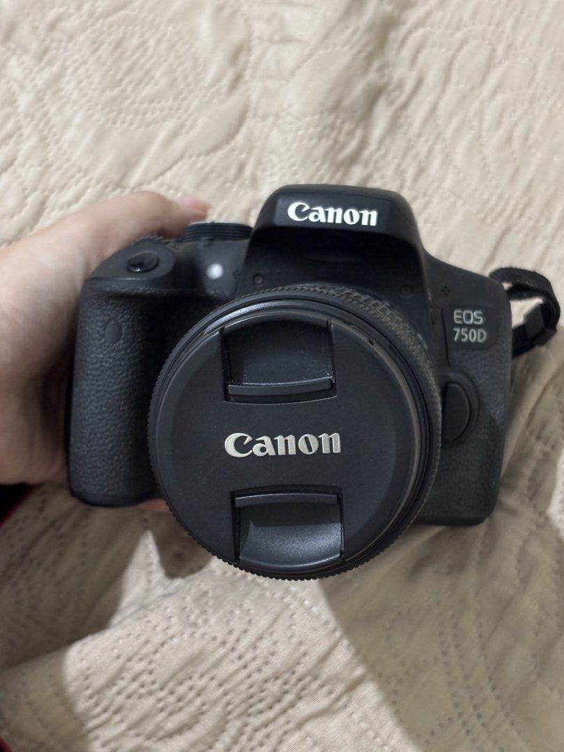 Canon EOS 750D DSLR Camera with 18-55mm Lens (Category: Cameras) located in Tarlac. Submitted by alxckretdump (Listing ID 1469925818, Image 1). Description: Canon EOS 750D DSLR camera with EF-S 18-55mm f/3.5-5.6 IS STM lens attached. Includes original neck strap and lens cap. Touchdown LCD screen flips out and rotates fully. Works great, takes sharp photos with accurate colors..