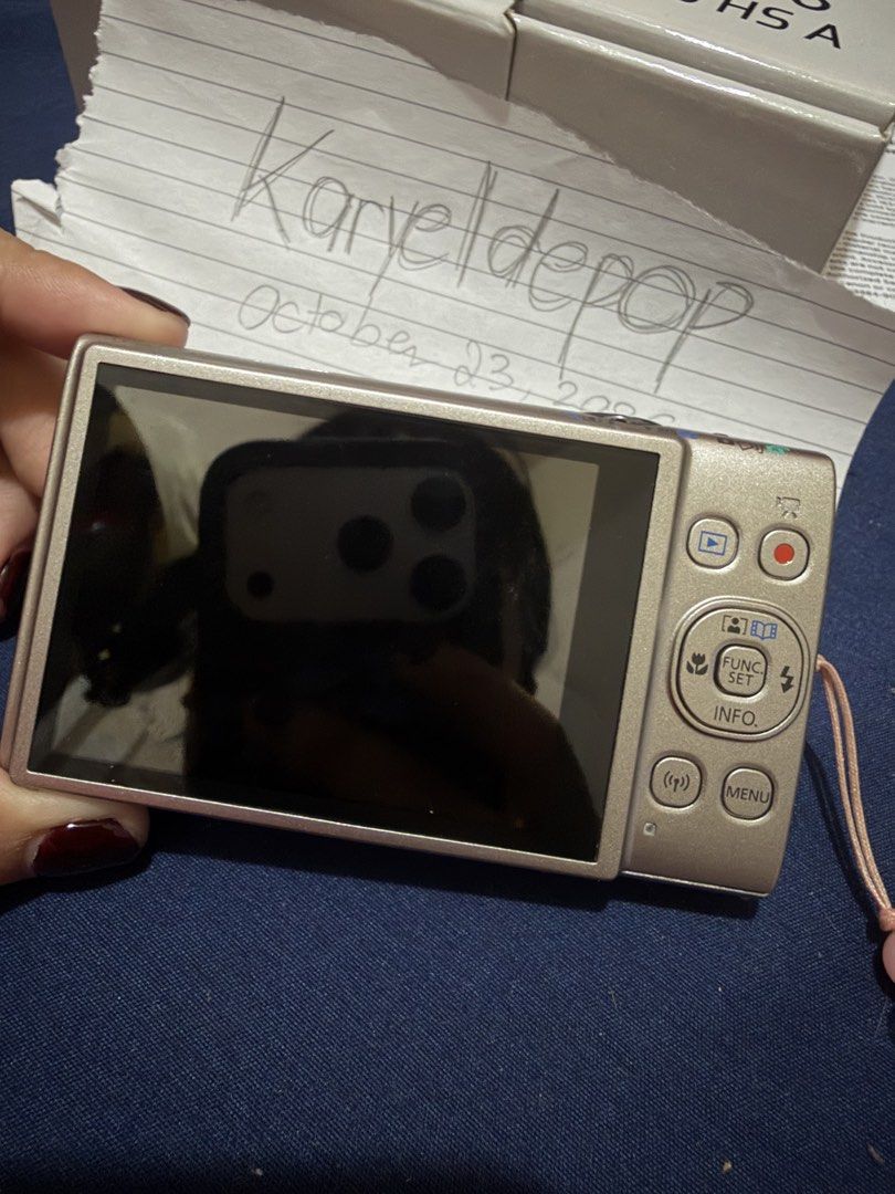 Canon IXUS 285 HS A Digital Camera with Box (Category: Cameras) located in Angeles City. Submitted by karyeldepop (Listing ID 1469923294, Image 2). Description: - Model: Canon IXUS 285 HS Digital Camera - Color: silver - Resolution & Zoom: 20.2 Megapixels with 12x Optical Zoom - Connectivity: has built-in Wi-Fi so can easily transfer photos to phone via app. Can also use connect camera to phone to check angles - Condition: 100% fully functional. 