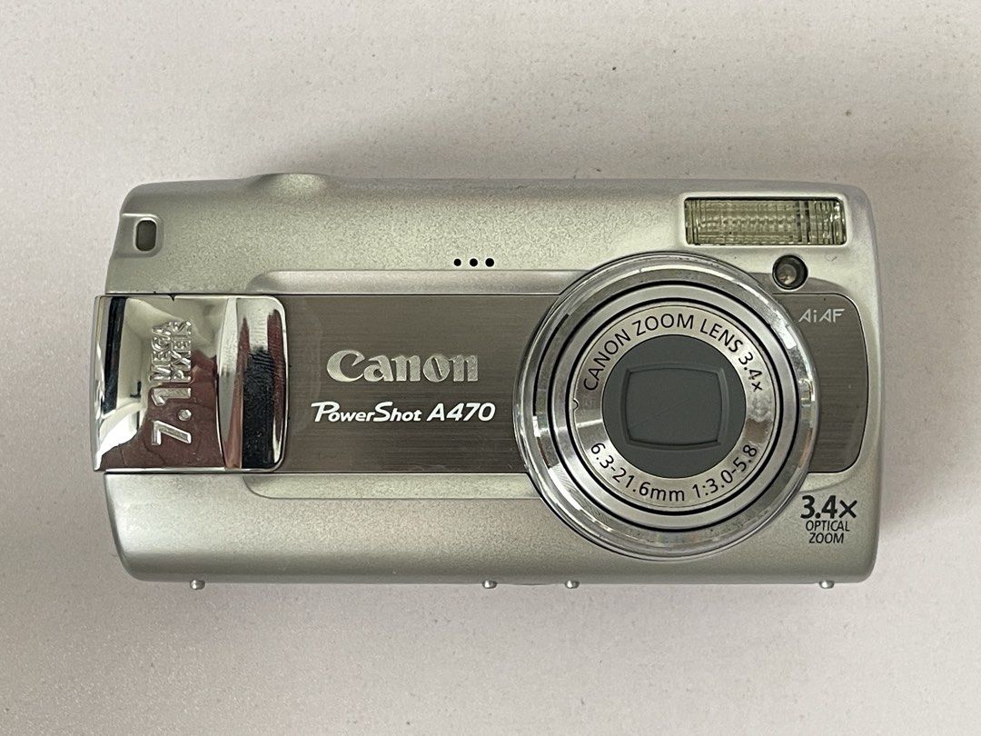 Canon PowerShot A470 Digital Camera (Category: Cameras) located in Manila. Submitted by m6iscy (Listing ID 1469834268, Image 1). Description: Canon PowerShot A470 (Silver) [] untested, unit as is [] used AA batteries [] no refund once paid [] quiapo location [] can do delivery, buyer will shoulder df .
