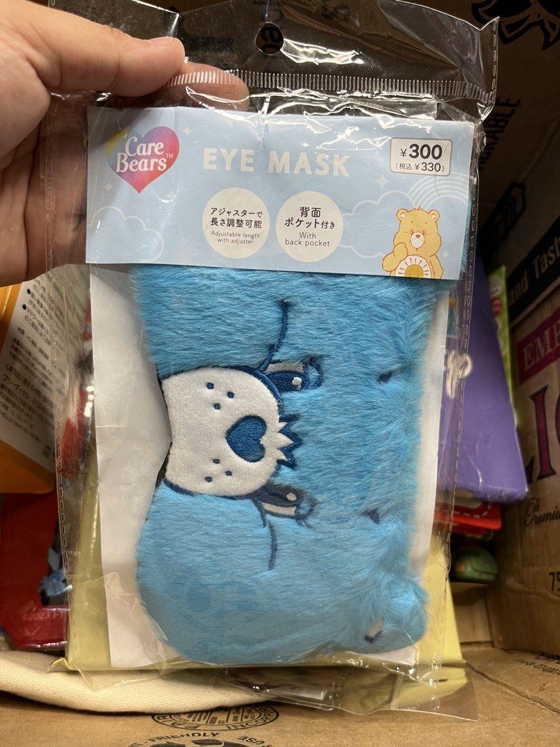 Care Bears Face B Blue Fluffy Eye Mask (Category: Face Care) located in Gapan. Submitted by lunashop14 (Listing ID 1469824328, Image 1). Description: - Brand: Care Bears - Color: Bright blue - Material: Super fluffy plush - Features: Cute face embroidery, adjustable strap, and a convenient back pocket - Condition: Brand new in original sealed packaging.