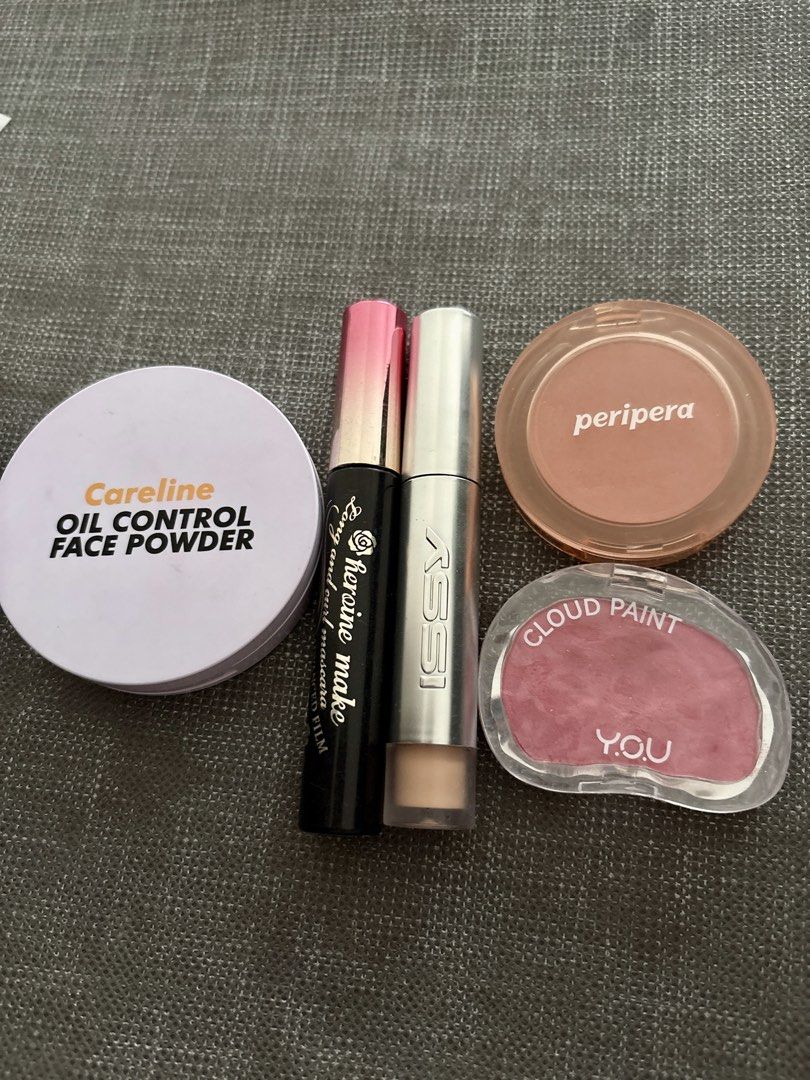 Careline, Heroine Make, ISSY, Peripera, Y.O.U Makeup Bundle (Category: Makeup) located in Binan City. Submitted by laurenarriane_owl (Listing ID 1469760294, Image 1). Description: - 5-piece everyday makeup bundle for fresh and natural looks - Careline Oil Control Face Powder (white compact) to keep shine at bay - Heroine Make Long and Curl Mascara Advanced Film (black tube) for smudge-proof lashes - ISSY Concealer (silver tube) for flawless cover