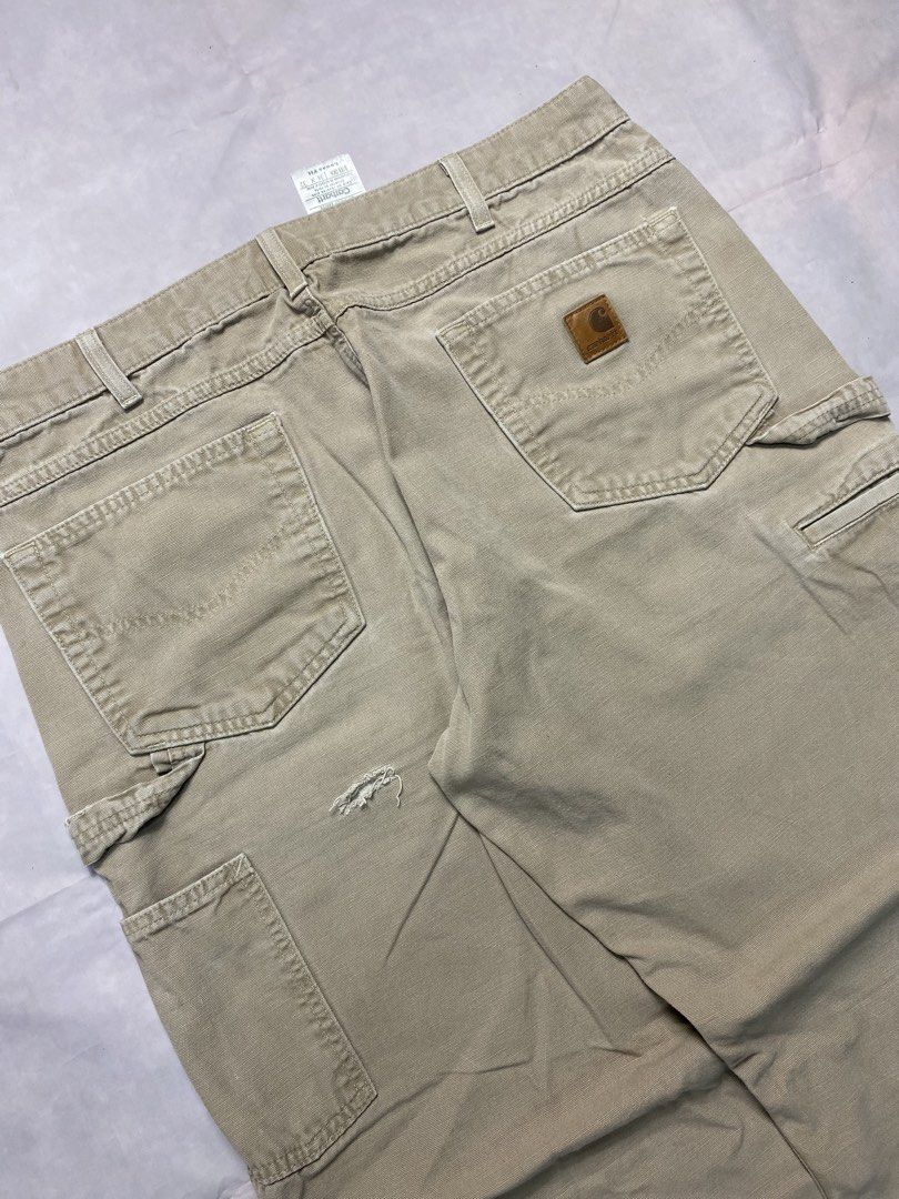 CARHARTT LOOSE FIT CARPENTER PANTS (Category: Activewear) located in Dasmarinas. Submitted by 2slickdeals_ (Listing ID 1469809603, Image 3). Description: SIZE 36x32 ON TAG 36 WAIST 13 THIGH 41 LENGTH 9 HEM ISSUE: BLACK STAIN, 1 HOLE SA BACK, DISTRESSED HEM PART. J&T / LALAMOVE / PICK UP!.
