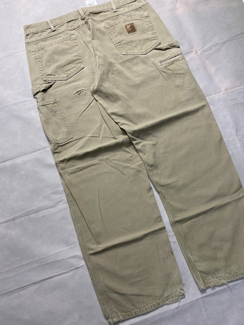 CARHARTT LOOSE FIT CARPENTER PANTS (Category: Activewear) located in Dasmarinas. Submitted by 2slickdeals_ (Listing ID 1469809603, Image 2). Description: SIZE 36x32 ON TAG 36 WAIST 13 THIGH 41 LENGTH 9 HEM ISSUE: BLACK STAIN, 1 HOLE SA BACK, DISTRESSED HEM PART. J&T / LALAMOVE / PICK UP!.