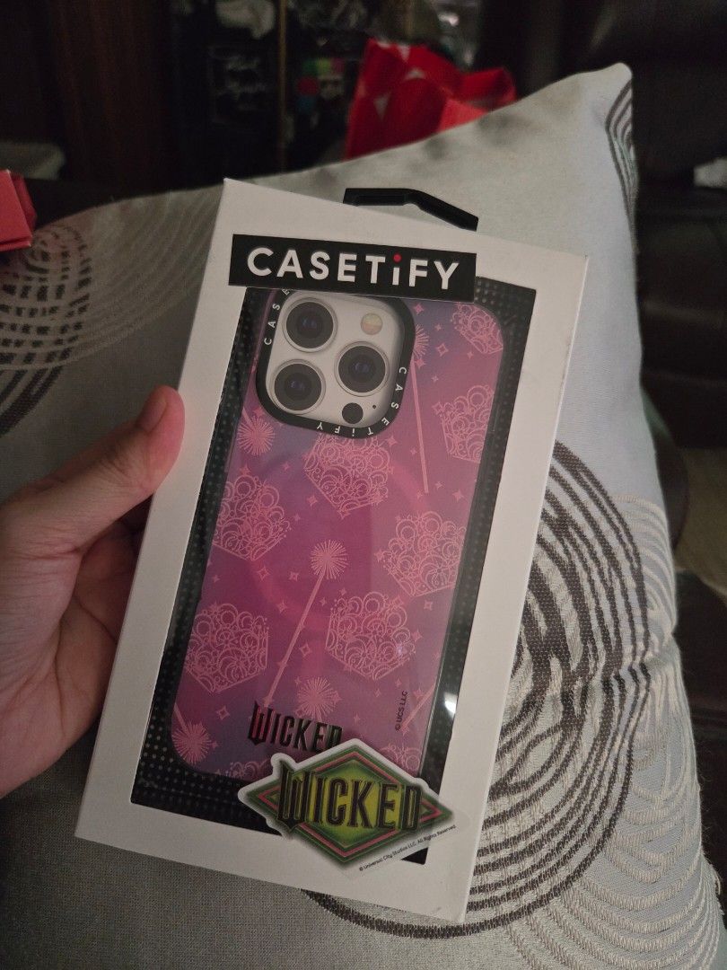 Casetify x Wicked - iPhone 14 Pro (Category: Cases & Sleeves) located in Paranaque City. Submitted by jangluvr (Listing ID 1469828946, Image 1). Description: Casetify x Wicked Collab iPhone 14 pro still in good condi ♡ rfs: sold my iphone 14 pro.