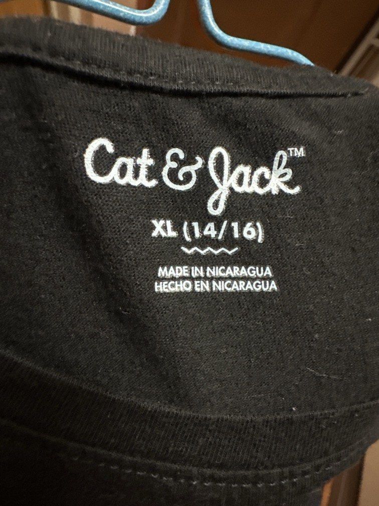 Cat & Jack Shirt (XL 14/16) (Category: Everything Else Others) located in Manila. Submitted by krystalchewey_ (Listing ID 1469860408, Image 3). Description: Used black short-sleeve T-shirt featuring a colorful panda bear face Actual Photo Posted 149php L-25 in W-18 in .