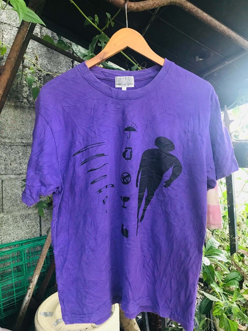 Cav Empt C.E Purple Graphic Tee Made in Japan (Category: Tshirts & Polo Shirts ) located in Camiling. Submitted by akosiano (Listing ID 1469839855, Image 1). Description: - Brand: Cav Empt - Color: Purple - Size: S - Material: 100% Cotton - Origin: Made in Japan - Features: Unique graphic prints on front and back - Condition: Wash tag clearly attached with care instructions.
