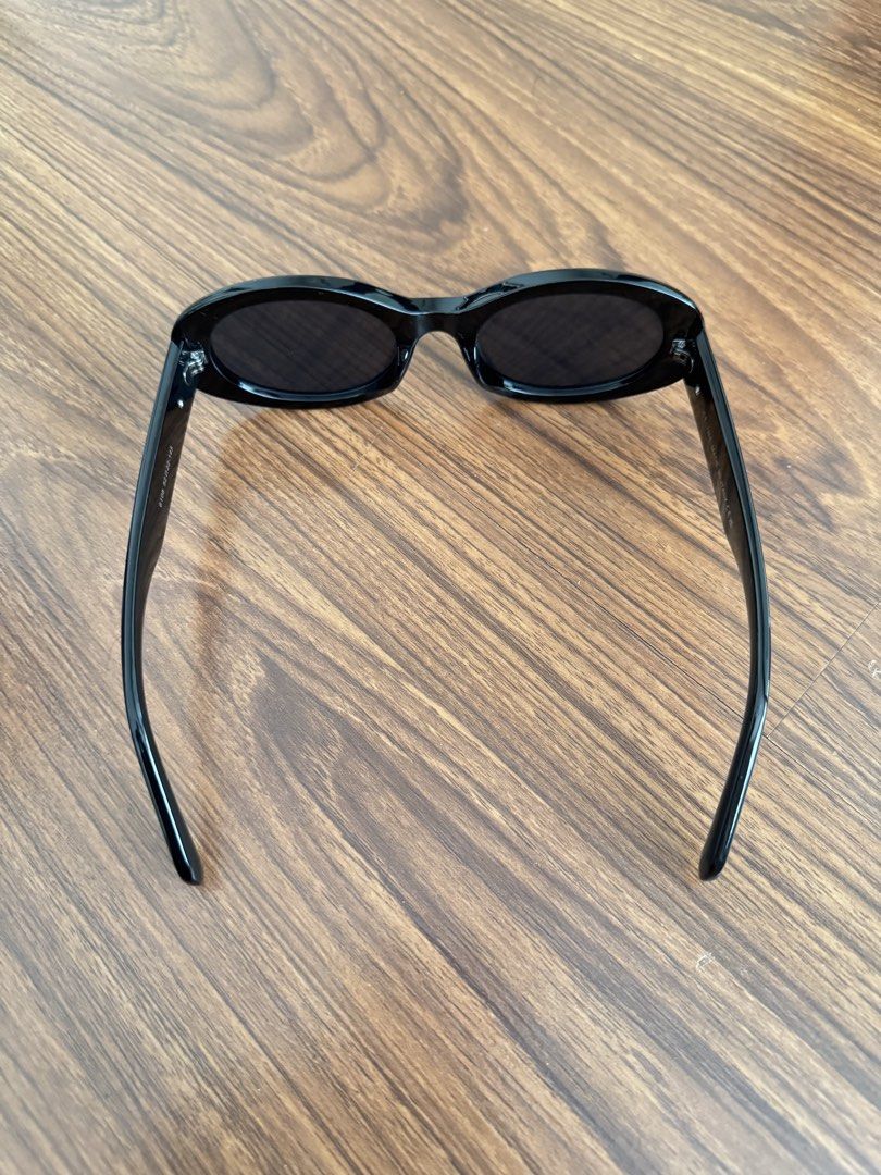 Celine Black Oval Sunglasses Model 6108 (Category: Sunglasses & Eyewear) located in Rizal. Submitted by thrifty.mom (Listing ID 1469860193, Image 2). Description: - Brand: Celine (Made in Italy) - Model: 6108 (52□22-145) - Frame: Black acetate in a chic oval shape - Lenses: Dark tinted with subtle Celine stamp on the right lens - Hardware: Gold-tone Triomphe logo on both temples - Condition: Excellent, clean frames with no scratches on hardware T