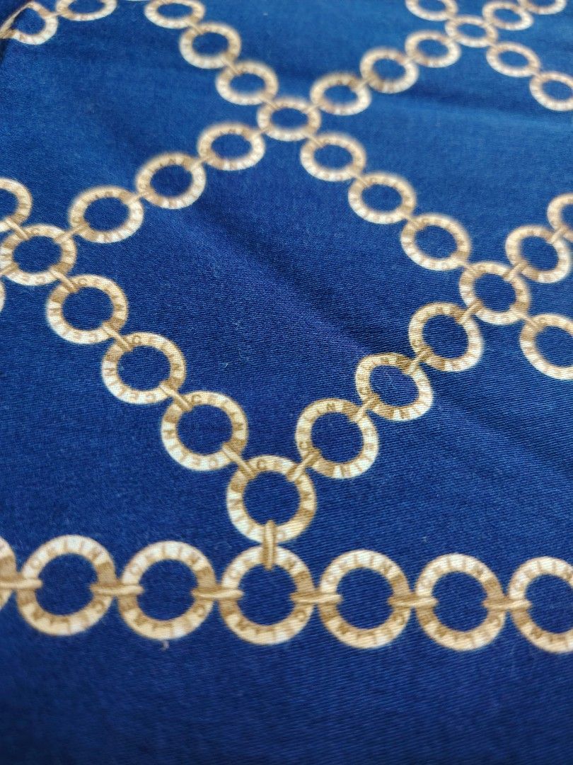 Celine Blue Chain Print Scarf 50x50cm (Category: Other Accessories) located in Valenzuela. Submitted by anna.banana10 (Listing ID 1469786707, Image 3). Description: - Brand: Celine - Design: Blue with gold chain link pattern and integrated logo - Size: 50 x 50 cm (Square) - Material: Smooth, premium fabric - Versatile use: Wear around the neck, tie on a handbag, or style as a hair accessory - Condition: Excellent, well-maintained - Mode of Paymen