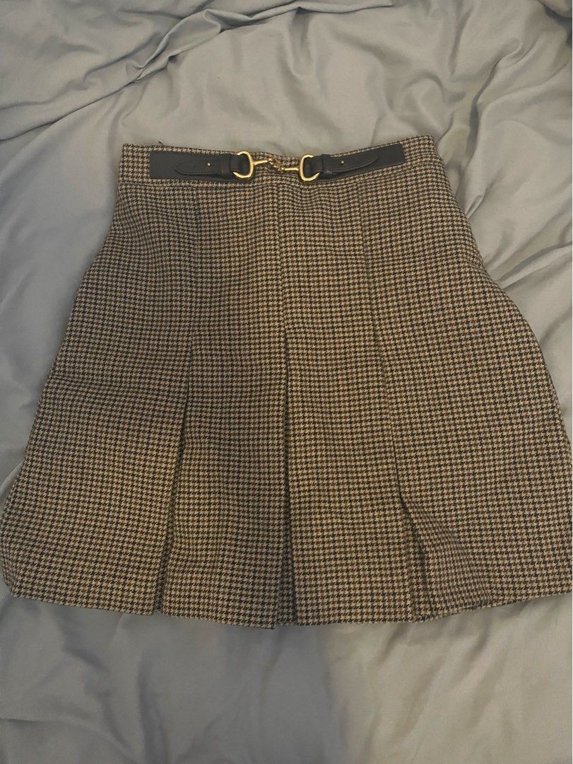 Celine Houndstooth Pleated Wool Skirt (Category: Luxury Apparel) located in Mandaluyong City. Submitted by drpshop (Listing ID 1469809315, Image 2). Description: Sourced from Japan, bought online. This is vintage celine. Found a similar listing being sold for 40k plus. NGA, please self authenticate. 2nd to 4th slide is the actual photo of the item. Small on tag, fits 24 to 25 waistline, for petite girlies , all details are posted..