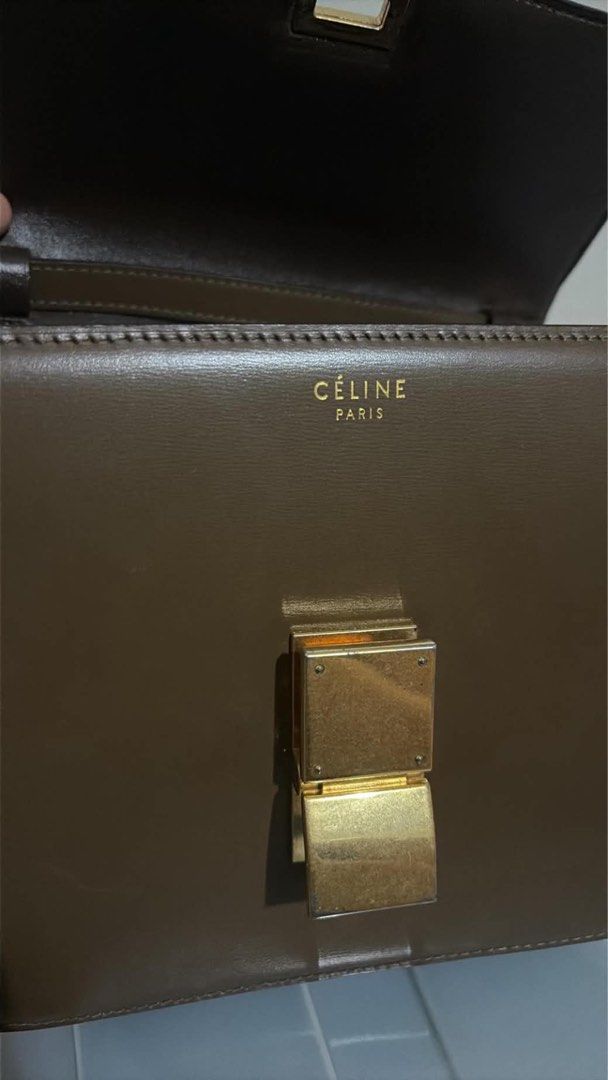 Celine Medium Classic Box Bag Brown Leather (Category: Luxury Bags & Wallets) located in Caloocan City. Submitted by theprelovedpurse (Listing ID 1469881392, Image 3). Description: - Brand: Celine - Style: Classic Box Bag - Color: Brown - Hardware: Gold-tone - Material: Leather with matching leather lining - Features: Structured silhouette, flap closure with metal clasp, adjustable shoulder strap, multiple interior compartments, zipped pocket, sl