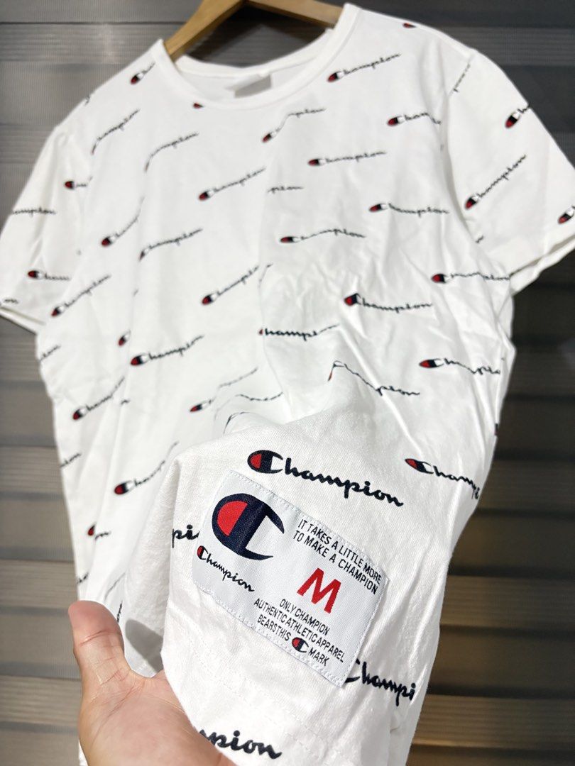 Champion All-Over Script Print White T-Shirt Size M (Category: Tshirts & Polo Shirts ) located in Las Pinas. Submitted by jaymar1999 (Listing ID 1469760911, Image 2). Description: Champion All-Over Script Print White T-Shirt Size M Size Medium Dimes L27xW22 No issue Excellent Price 450+Sf Location Manilas Las Piñas .