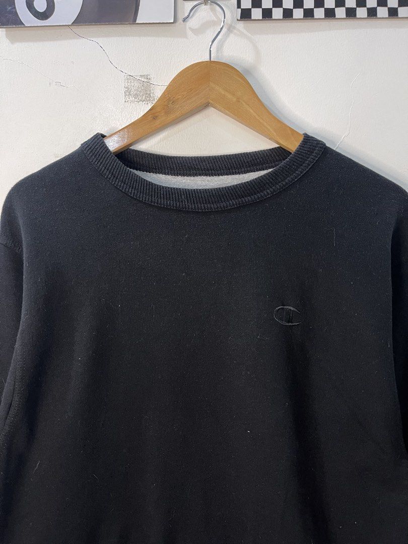 Champion Black Crewneck Sweatshirt Size S (Category: Coats, Jackets and Outerwear) located in Cabagan. Submitted by blessingma81004 (Listing ID 1469759019, Image 3). Description: - Color: Black - Brand: Champion - Size: Fits like a Large (Width: 20.5", Length: 27.5") - Details: Small embroidered chest logo and sleeve patch - Material: 50% cotton, 50% polyester blend.