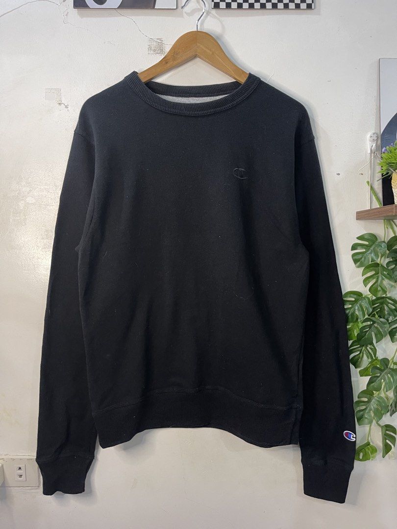 Champion Black Crewneck Sweatshirt Size S (Category: Coats, Jackets and Outerwear) located in Cabagan. Submitted by blessingma81004 (Listing ID 1469759019, Image 2). Description: - Color: Black - Brand: Champion - Size: Fits like a Large (Width: 20.5", Length: 27.5") - Details: Small embroidered chest logo and sleeve patch - Material: 50% cotton, 50% polyester blend.