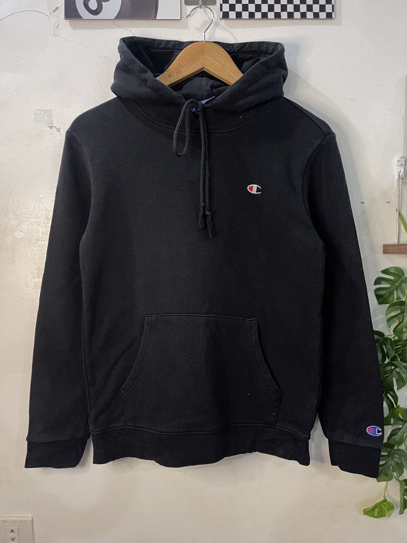 Champion Black Hoodie Multi Logo Backprint (Category: Hoodies) located in Cabagan. Submitted by blessingma81004 (Listing ID 1469767567, Image 3). Description: - Brand: Champion - Color: Solid Black - Design: Stacked script logo down the back with embroidered 'C' logo on chest and sleeve - Features: Adjustable drawstring hood and front pouch pocket - Material: Comfortable cotton blend - Size: Tagged M (fits closer to Small: 18.5" width x 25" lengt