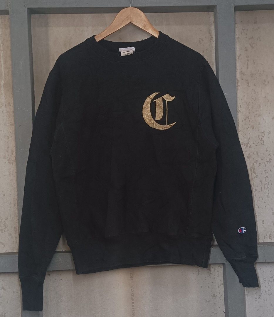 Champion Reverse Weave Black Sweatshirt Small (Category: Coats, Jackets and Outerwear) located in Muntinlupa City. Submitted by thriftben (Listing ID 1469805963, Image 2). Description: - Brand: Champion - Style: Reverse Weave Sweatshirt (Style Code: GF70 BKC) - Color: Black - Size: Small - Material: 82% Cotton, 18% Polyester (Made in Honduras) - Chest: Embroidered Old English 'C' logo - Back: Multi-colored appliqued 'CHAMPION' lettering across th