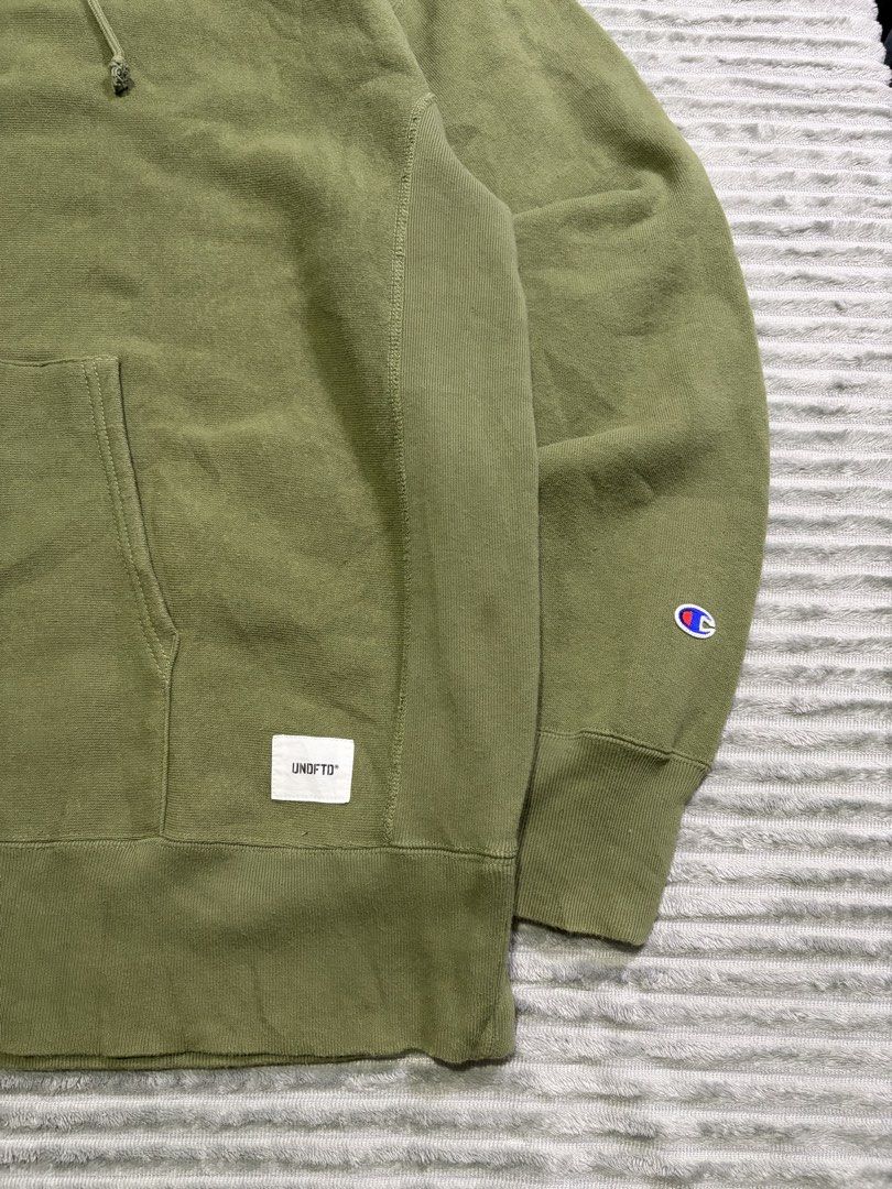 Champion Reverse Weave x Undefeated (Category: Coats, Jackets and Outerwear) located in Kawit. Submitted by samfuentebella09 (Listing ID 1469865154, Image 3). Description: CHAMPION REVERSE x UNDEFEATED ARMY GREEN HOODIE JACKET✅ ▪️Size XLARGE on tag✅ ▪️Width”25 x 29”Length✅ ▪️Excellent Condition 9/10✅ ▪️Color Rate 10/10✅ ▪️Good As New✅ Add sf💸 Pm🔑.