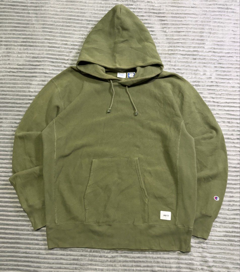 Champion Reverse Weave x Undefeated (Category: Coats, Jackets and Outerwear) located in Kawit. Submitted by samfuentebella09 (Listing ID 1469865154, Image 1). Description: CHAMPION REVERSE x UNDEFEATED ARMY GREEN HOODIE JACKET✅ ▪️Size XLARGE on tag✅ ▪️Width”25 x 29”Length✅ ▪️Excellent Condition 9/10✅ ▪️Color Rate 10/10✅ ▪️Good As New✅ Add sf💸 Pm🔑.