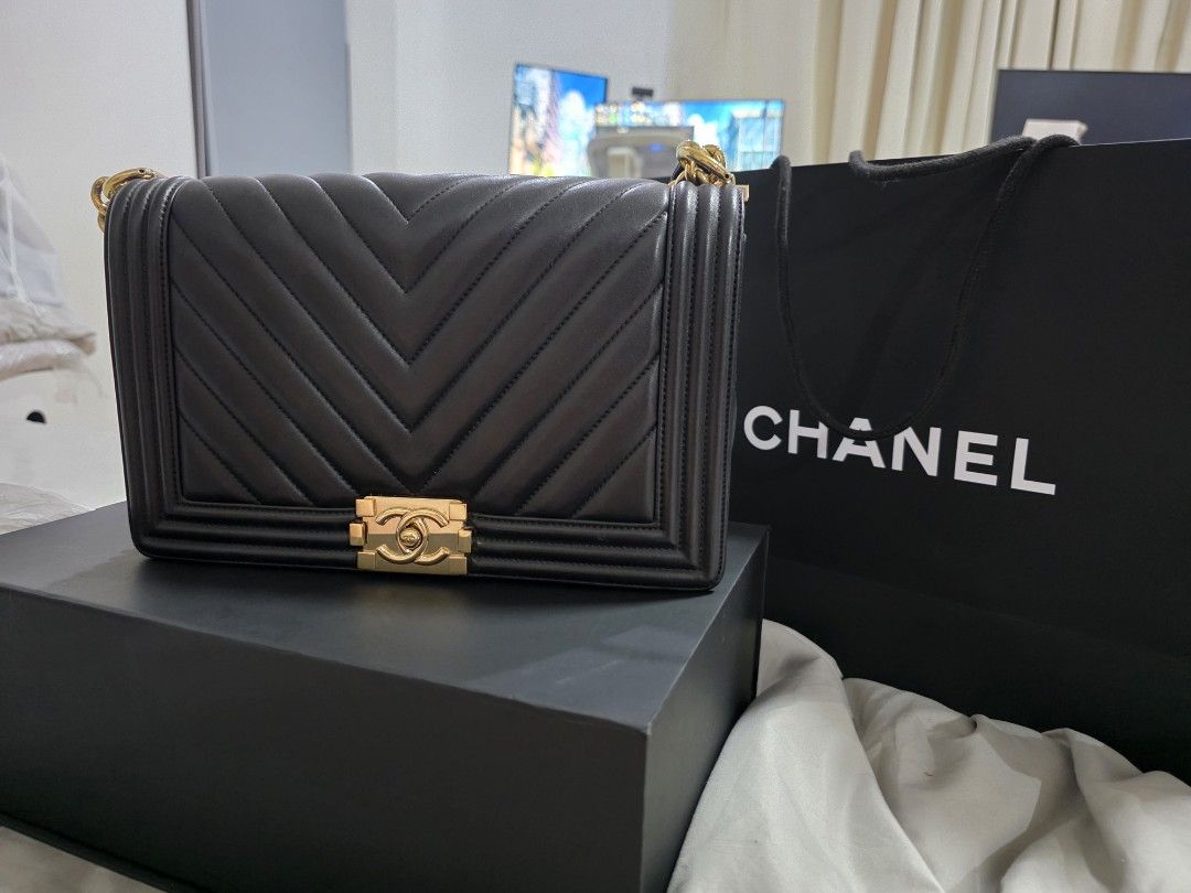 Chanel Le boy New Medium Chevron Calfskin (Category: Luxury Bags & Wallets) located in Mandaluyong City. Submitted by chloebuysthings (Listing ID 1469913133, Image 1). Description: Chanel Le boy new medium series 23 Complete inclusions: cards, papers, dust bag, box, with legit grails authentication. chevron, calfskin, champagne gold hardware.