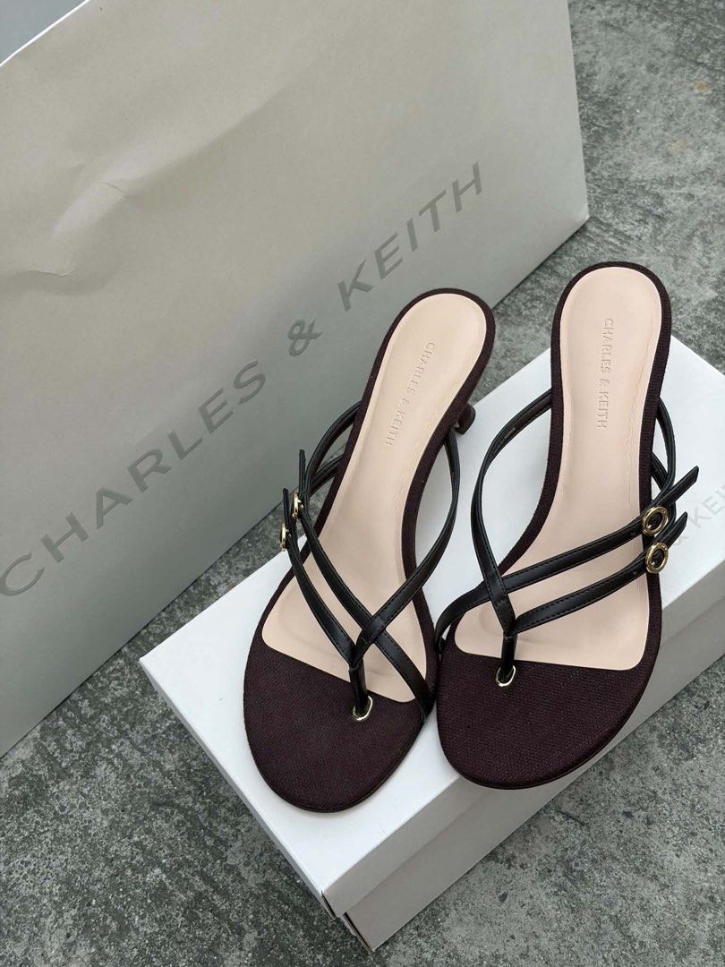 Charles & Keith Thong Strap Kitten Heels (Category: Heels) located in Valenzuela. Submitted by kissmuna (Listing ID 1469909030, Image 1). Description: - Brand: Charles & Keith Size 7 Mall price around 4k - Condition: used once for my birthday , kept in original box - Inclusions: Original white shoebox and large paper shopping bag.