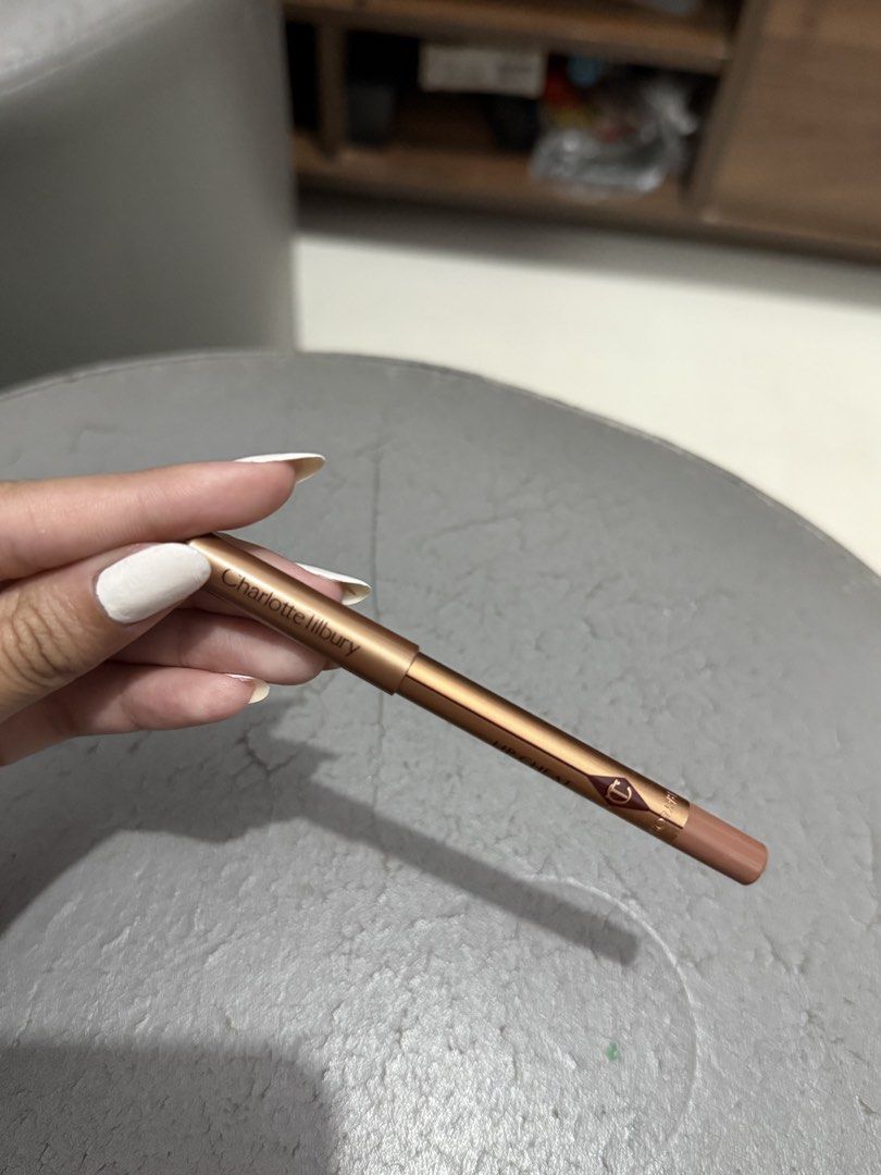 Charlotte Tilburry Mini Lip Liner Iconic Nude (Category: Makeup) located in Pateros City. Submitted by wieepaa_ (Listing ID 1469893135, Image 1). Description: - not used - it was a set but not my shade - guaranteed authentic.