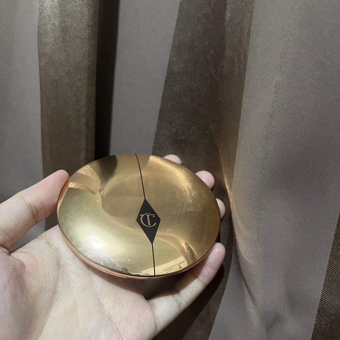 Charlotte Tilbury Powder (Medium)(refillable) (Category: Makeup) located in Bacoor. Submitted by _paulinea (Listing ID 1469913977, Image 1). Description: - refillable - used not more than 3x - prefer lighter shade - naka store lang sa lalagyan - bought in australia - no box.
