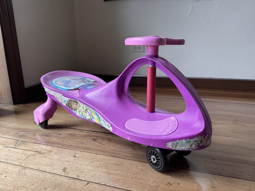 Children's Swing Twist Car (Category: Kids Toys) located in Quezon City. Submitted by rickybobby100 (Listing ID 1469868693, Image 1). Description: Children's Swing Twist Car Used very good condition Declutter 500 only Pickup QC near Robinsons Magnolia.