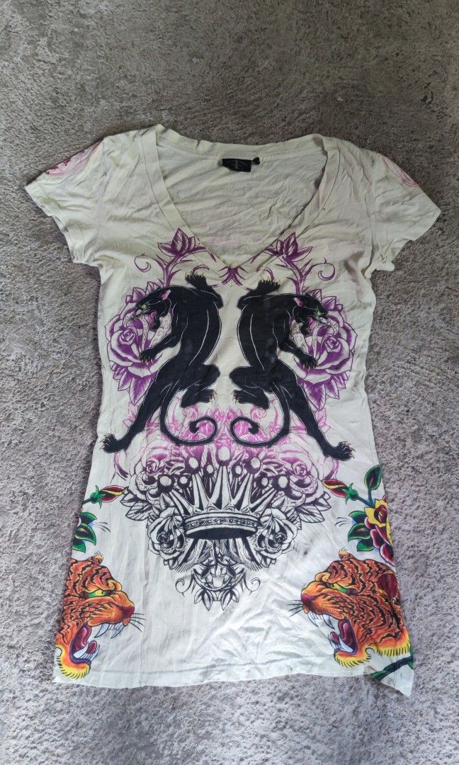 Christian Audigier (Category: Shirts) located in General Santos City (Dadiangas). Submitted by thrifthing1 (Listing ID 1469779223, Image 2). Description: Christian Audigier excellent condition Dimes 14inches in the waist 18 bottom hem 28 length.