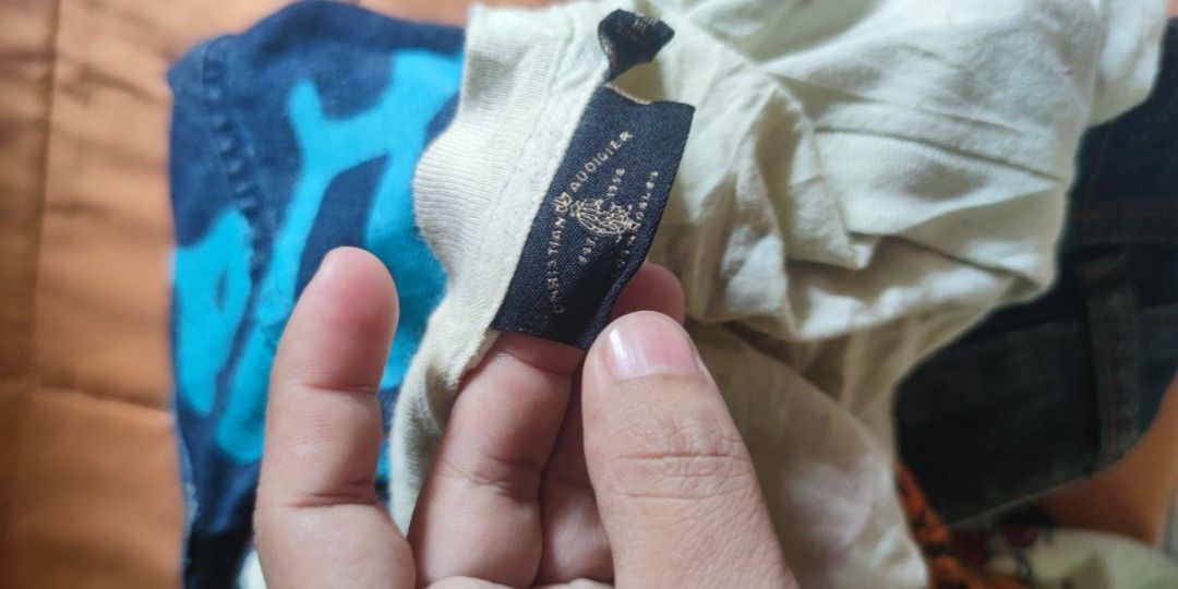 Christian Audigier (Category: Shirts) located in General Santos City (Dadiangas). Submitted by thrifthing1 (Listing ID 1469779223, Image 3). Description: Christian Audigier excellent condition Dimes 14inches in the waist 18 bottom hem 28 length.