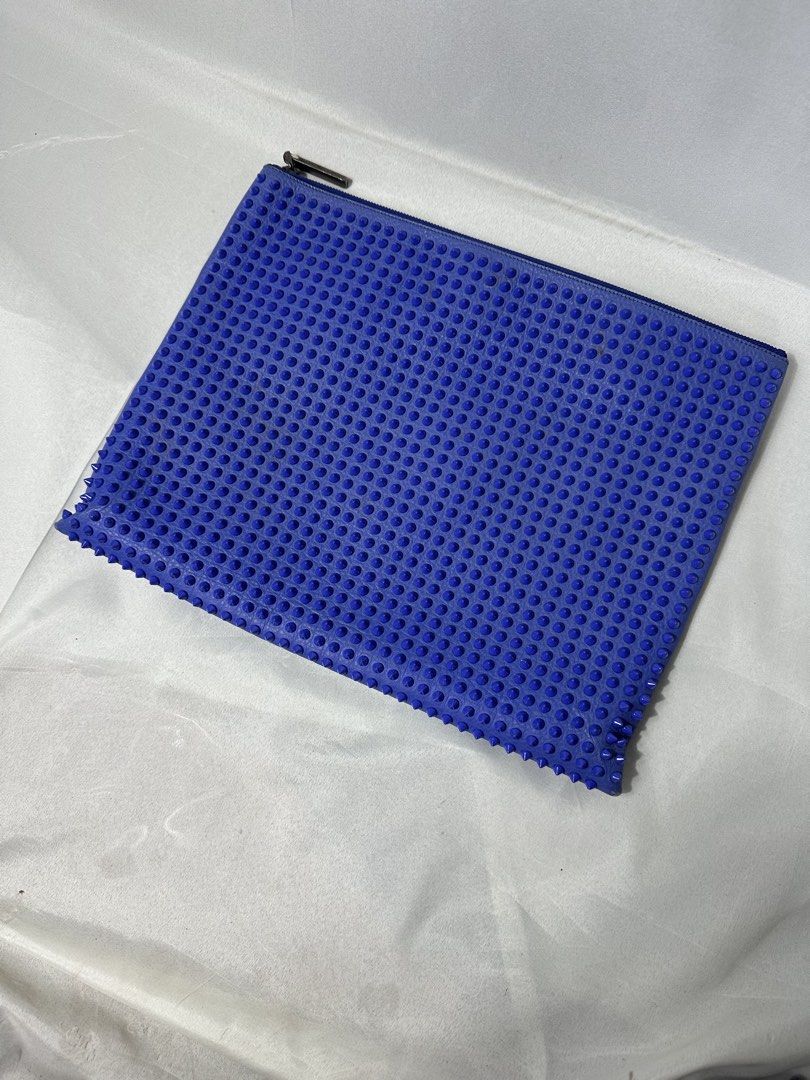 Christian Louboutin Stud Document Bag (Category: Luxury Bags & Wallets) located in Cabanglasan. Submitted by thefashiongarage.co (Listing ID 1469764099, Image 2). Description: Title - Christian Louboutin Model/Name - Stud Document Bag Size on Tag - Medium Conditiion - Excellent Condition eith Corner Rubs Only - Stud are intact and complete Dimension (WxLxH) - 15x12 Inches Category- Casual/Formal Fitting - Made in - Italy Material - Leather Color 