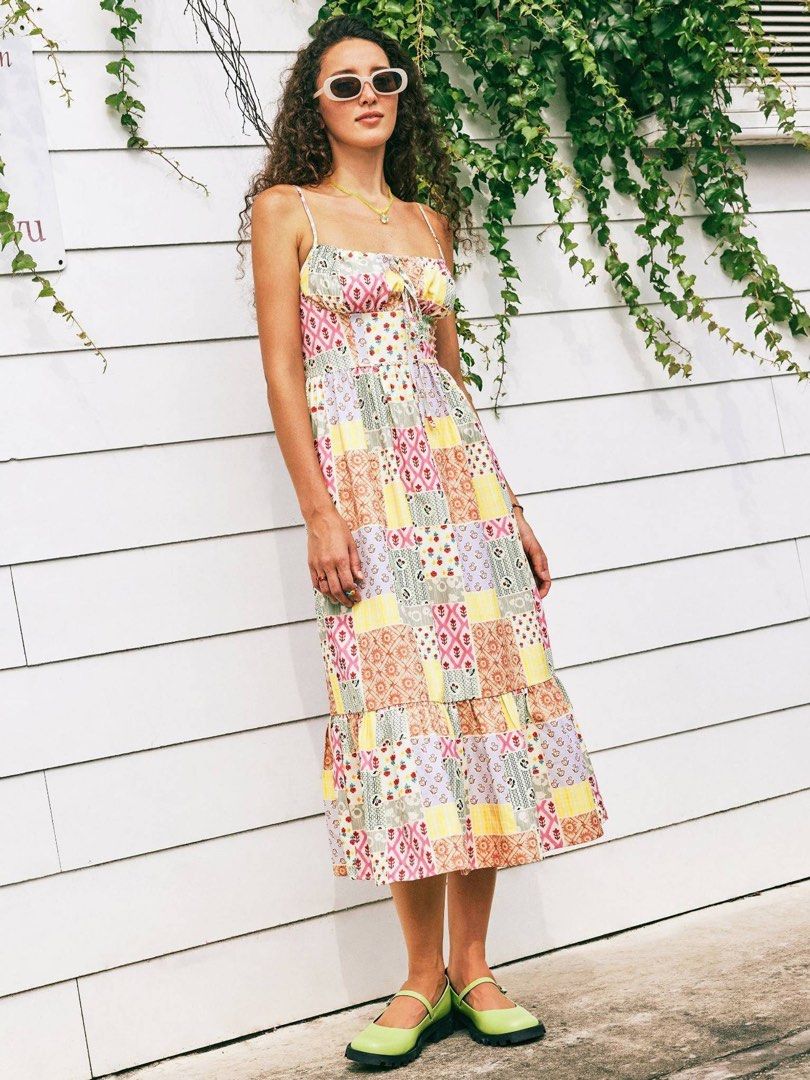 CIDER Patchwork Floral Midi Cami Dress with Tie Front (Category: Dresses) located in Las Pinas. Submitted by pisces_queen (Listing ID 1469936650, Image 3). Description: - Multi-colored patchwork midi dress with a sweet floral pattern - Features adjustable thin straps and a cute tie-front square neckline - Fitted bodice leading to a flared, tiered skirt - Lightweight and easy to slip on for warm weather - Perfect for casual days, pair easily with 