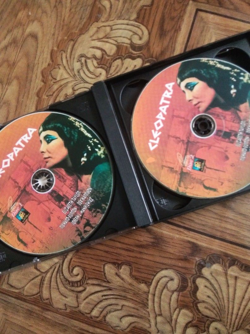 Cleopatra Movie 4-disc cd edition (Category: CDs & DVDs) located in Caloocan City. Submitted by lonewolf22 (Listing ID 1469797414, Image 2). Description: - Title: Cleopatra (1963 Classic Epic) - Starring: Elizabeth Taylor & Richard Burton - Format: Complete multi-disc VCD in original jewel case - Runtime: 246 minutes - Director: Joseph L. Mankiewicz - Distributor: Viva Home Entertainment (Philippines) - Condition: Clean discs, case intact with mi
