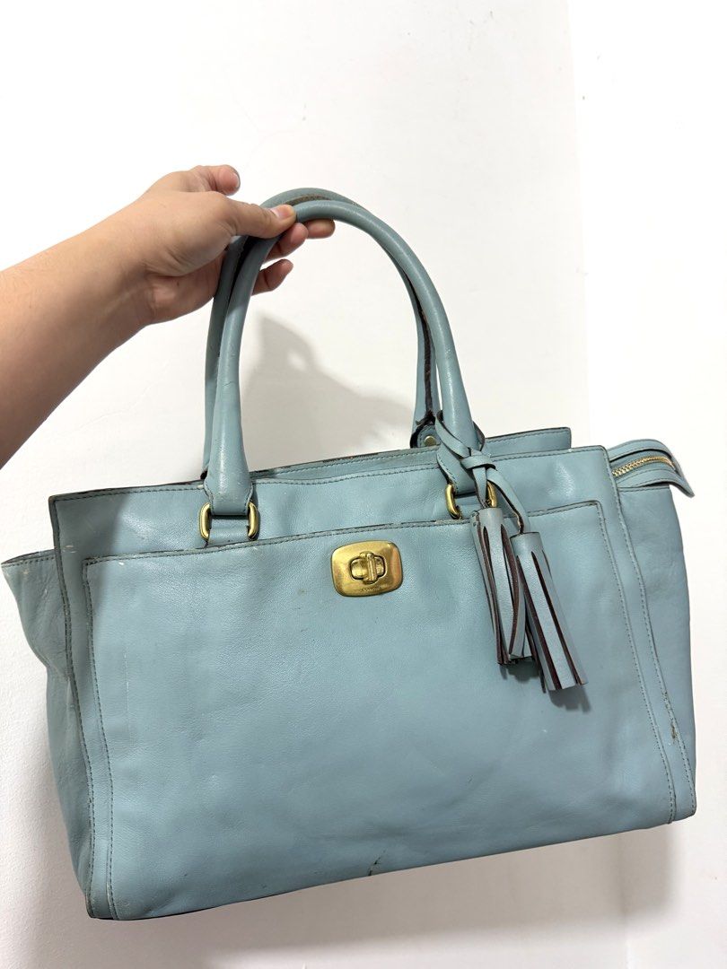 Coach legacy (Category: Shoulder Bags) located in Manila. Submitted by prelovedbyramiah (Listing ID 1469772050, Image 1). Description: sign of used.