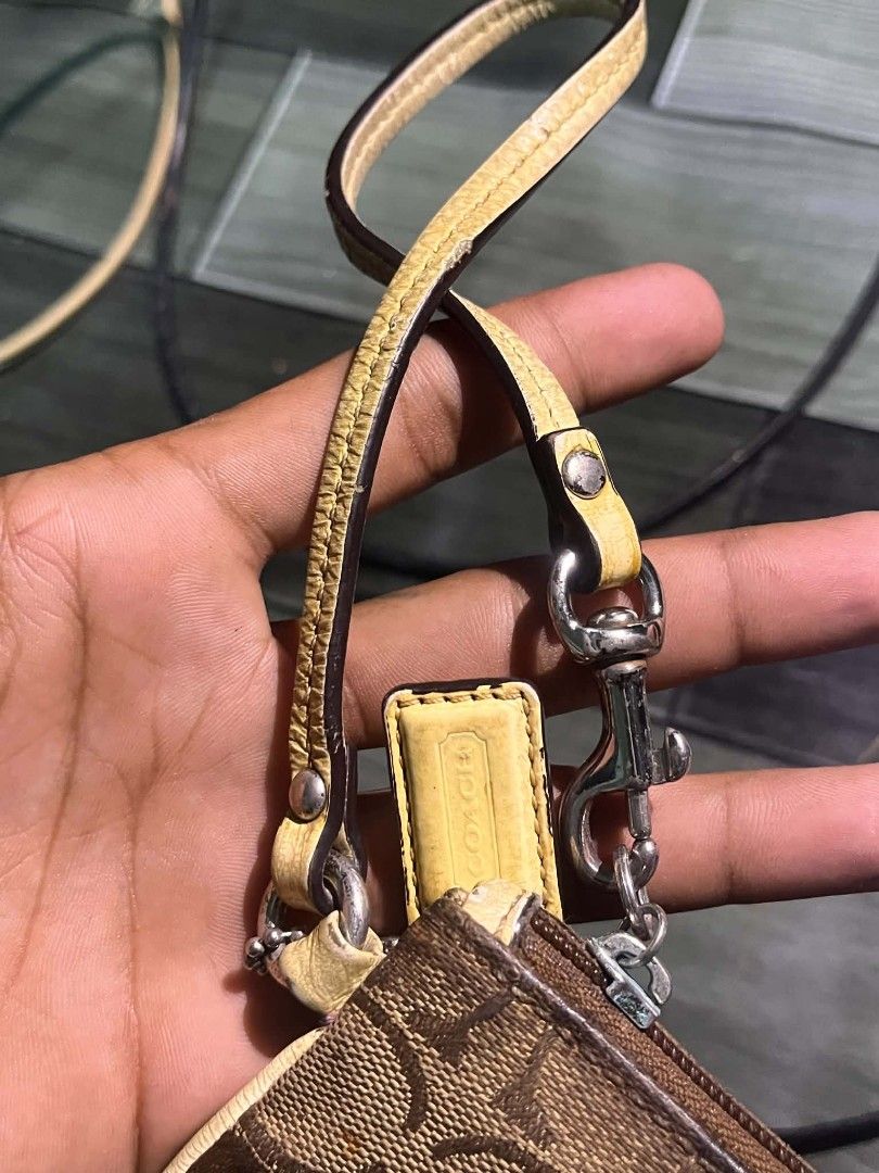 Coach leatherware (Category: Luxury Bags & Wallets) located in Marikina City. Submitted by baboikss (Listing ID 1469889915, Image 3). Description: Coach legacy striped good condition issue-see the last pic.