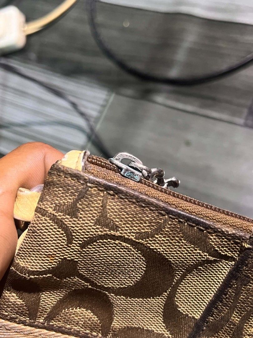 Coach leatherware (Category: Luxury Bags & Wallets) located in Marikina City. Submitted by baboikss (Listing ID 1469889915, Image 2). Description: Coach legacy striped good condition issue-see the last pic.