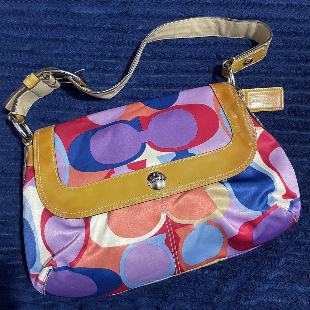 Coach Multicolor Soho (Category: Luxury Bags & Wallets) located in Manila. Submitted by thegoodandthebag (Listing ID 1469921686, Image 1). Description: Coach Multicolor Soho 🔖 ₱6,800 + SF • Lightly Used • Guaranteed Authentic • Slightly Nego • See photos for flaws • NO REFUND/NO RETURN/NO EXCHANGE Note: Please manage your expectations as this is a preloved and vintage piece. *Actual color may vary due to lighting* PM for inquiries! 📩 Follow us 