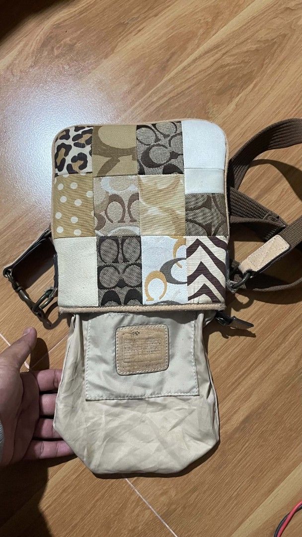 Coach Patchwork Signature Crossbody Bag (Category: Cross-body Bags) located in Bayambang. Submitted by ducojanus904184 (Listing ID 1469887739, Image 2). Description: - Brand: Coach - Style: Signature Patchwork Crossbody Bag - Colorway: Brown, beige, and white - Exterior: Multi-pattern fabric featuring classic C prints, polka dots, leopard print, and stripes - Hardware: Gold-tone - Strap: Adjustable brown canvas shoulder strap - Closure & Interior