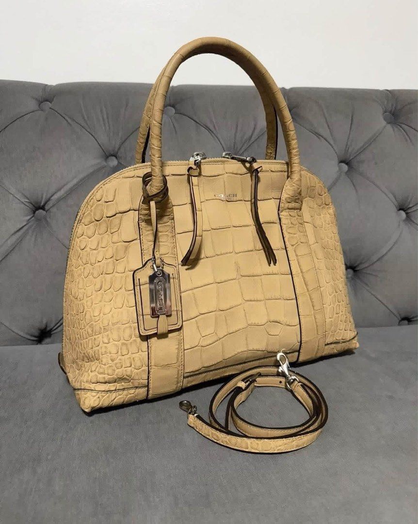 Coach Pink Carriage Print Tote Bag (Category: Luxury Bags & Wallets) located in Calamba. Submitted by saiphsavion (Listing ID 1469930713, Image 3). Description: - Authentic Coach tote bag in a chic pink monogram carriage and horse print - Features white leather straps, trim, and a stylish hanging luggage tag - Secure front metal clasp closure with sleek silver hardware - Spacious fabric interior, perfect for books, wallets, and daily essentials -