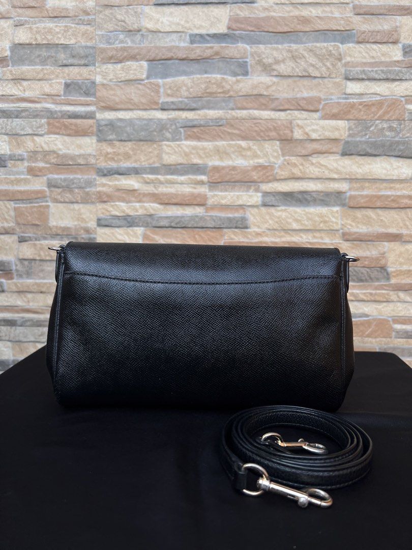 Coach Ruby Crossbody (F54849) (Category: Luxury Bags & Wallets) located in Cavite. Submitted by justbrowsing_decluttering (Listing ID 1469838144, Image 2). Description: Cross-body | Shoulder Bag 1 Full pocket outside | 1 Full Zip pocket inside Color: Black with Gold Tone Hardware Size: Small Material: Genuine Leather [Colors may vary due to lighting. Bags are Preowned so it will Not be Perfect; Unless stated new.] Faded Gold Tone Hardware Scuff c