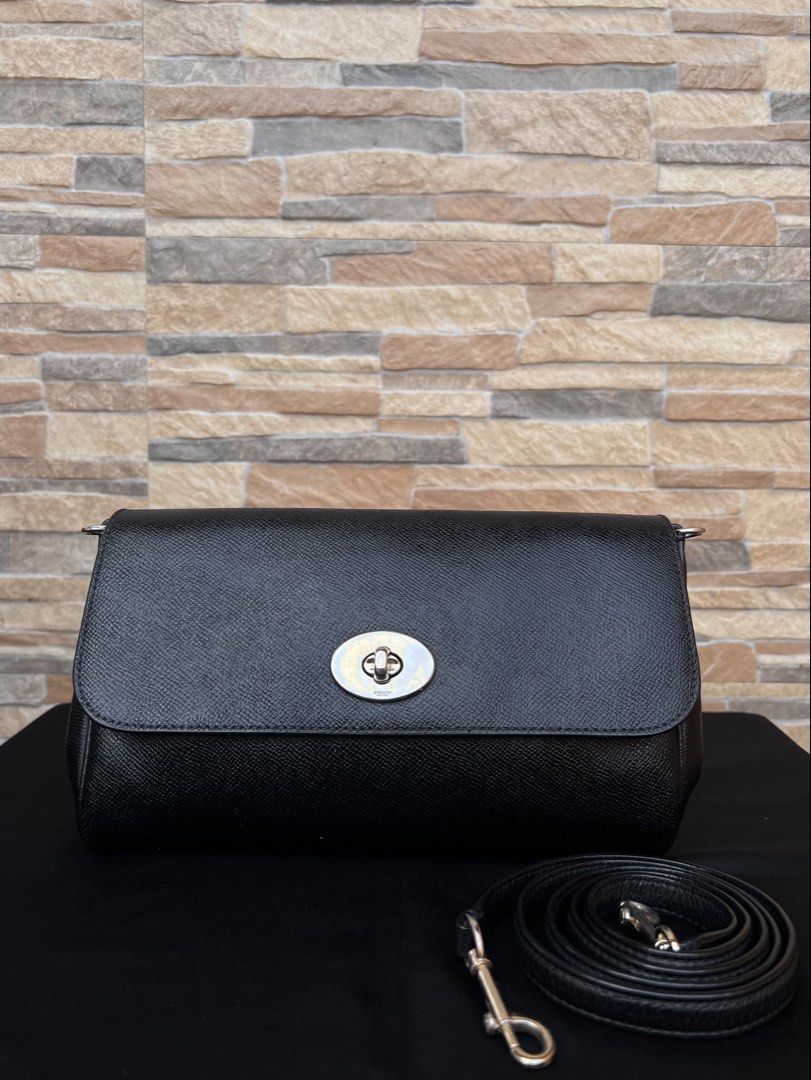Coach Ruby Crossbody (F54849) (Category: Luxury Bags & Wallets) located in Cavite. Submitted by justbrowsing_decluttering (Listing ID 1469838144, Image 1). Description: Cross-body | Shoulder Bag 1 Full pocket outside | 1 Full Zip pocket inside Color: Black with Gold Tone Hardware Size: Small Material: Genuine Leather [Colors may vary due to lighting. Bags are Preowned so it will Not be Perfect; Unless stated new.] Faded Gold Tone Hardware Scuff c